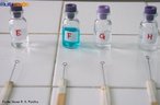 Foto tirada no Colgio Estadual do Paran, no laboratrio de Qumica, para identificao de elementos qumicos pelo teste de chama. <br/><br/> Palavras-chave: Material de laboratrio. Teste de chama. Elementos qumicos. Tabela peridica.