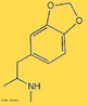 Representao da molcula de ecstasy.  uma droga moderna sintetizada (feita em laboratrio), neurotxica, cujo efeito na fisiologia humana  a diminuio da reabsoro da serotonina, dopamina e noradrenalina no crebro, onde estas substncias ficaro em maior contato entre as sinapses, causando euforia, sensao de bem-estar, alteraes da percepo sensorial do consumidor e grande perda de lquidos, pertencente a famlia das anfetaminas. <br/><br/> Palavras-chave: Ecstasy. Molcula. Drogas.