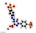 A tartrazina, também conhecida como E102, é um pigmento sintético pertencente ao grupo funcional dos azo-compostos (compostos orgânicos que apresentam nitrogênio em sua estrutura química), e que proporciona a cor amarelo-limão se utilizada como corante alimentar, por exemplo. Molécula em 3D. <br/><br/> Palavras-chave: Tartrazina. Pigmento sintético. Azo-composto. Corante alimentar.